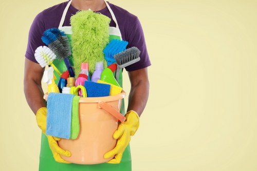 Technician preparing carpet cleaning equipment safely