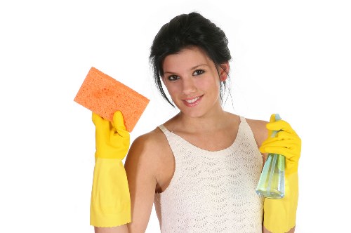 Cleaning technician reviewing safety and liability considerations before work begins